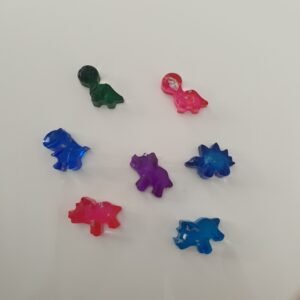 Marcadores de dinosaurios de resina